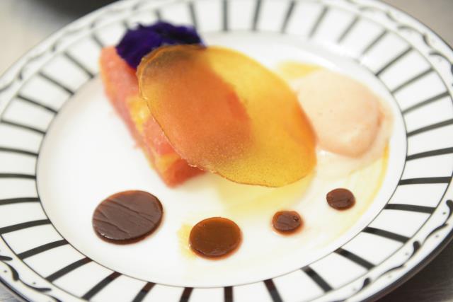 Rafraîchi d'agrumes à la cardamome et badiane, sorbet Campari.