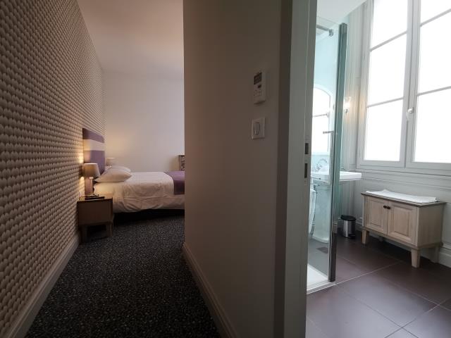 L'une des chambres de l'hôtel Héritage, entièrement rénové.