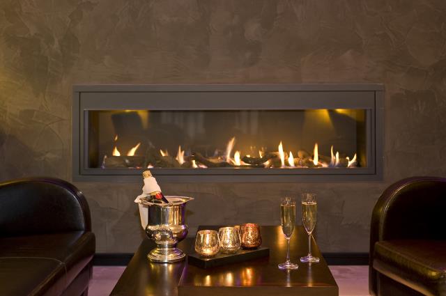 Cheminée à gaz de l'Hostellerie des Châteaux & Spa à Ottrott (67).