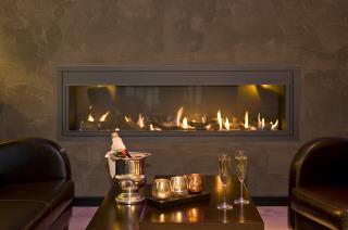 Cheminée à gaz de l'Hostellerie des Châteaux & Spa à Ottrott (67).