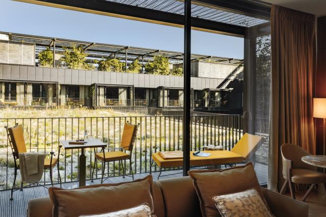 Chambre exécutive avec vue sur jardin de l'hôtel Madame Rêve.