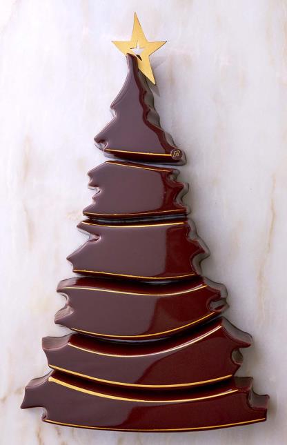 La bûche Sapin signée François Perret, chef pâtissier du Ritz, a la saveur des Noëls chocolat-praliné.