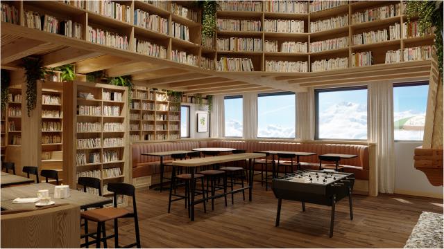 Le salon bibliothèque de L'Ours Hotel, aux Ménuires.