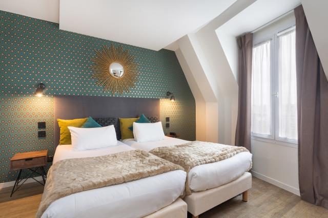 Une chambre du Best Western Hôtel Ohm, Paris XVIe, décorée avec l'enseigne Maisons du Monde