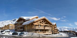 Le Cristal de l'Alpe, six beaux chalets coiffés de lauzes et habillés de pierres et de bois, conçu...