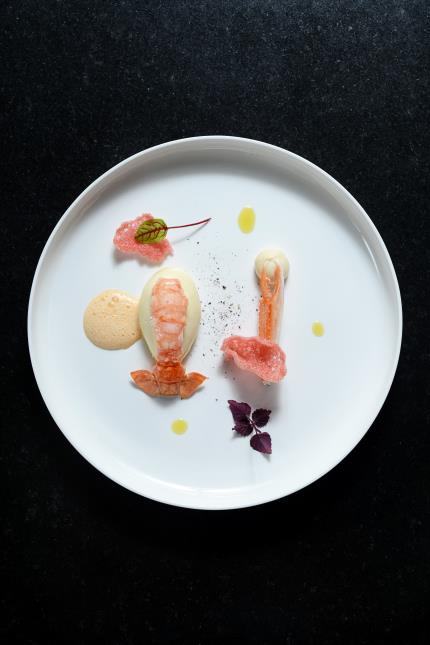 Quenelles de langoustines, champignons sauvages et émulsion de tête perlée à l'huile de noisette