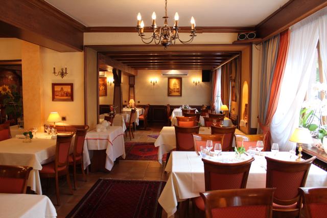 La salle du restaurant est classique mais sera appelée à changer