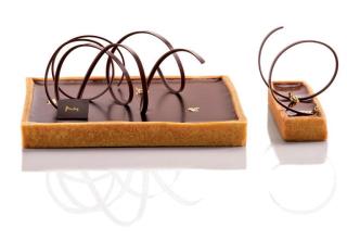 La tarte au chocolat imaginé par le chef Nicolas Cloiseau, digne héritière des subtilités de la...