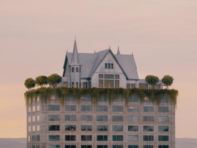 Maison Heler à Metz, monolithe de neuf étages surplombé par une maison lorraine.