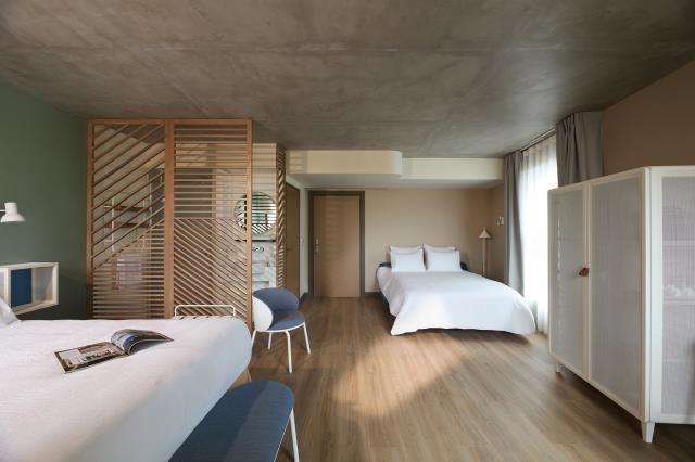 Une chambre familiale de l'Okko Hotels Troyes.