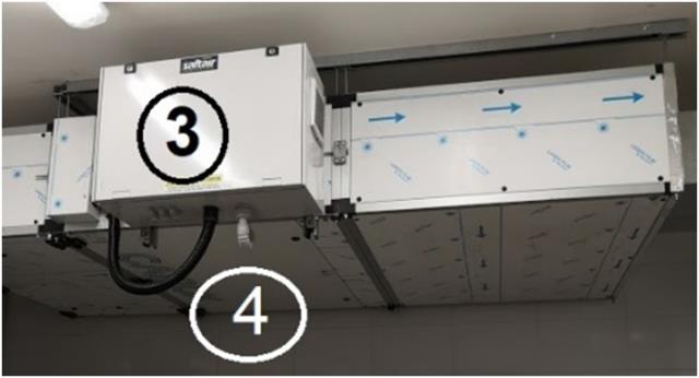 L'air est aspiré dans un caisson à charbon actif (3) puis sort dans la turbine d'extraction (4).