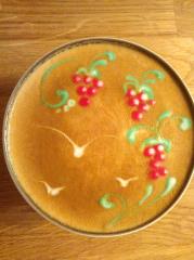 Des petites grappes de raisins sur un cappuccino, une des dernières créations de Rudy Dupuis.