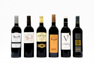 De g à d : Château Couronneau – Cuvée Pierre de Cartier, Grand Vin de Reignac, Château de La Cour...