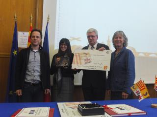 Christine Sandel, Conseillère Régionale, remet l'Olivier d'argent à Bernard Reynal, Président de la...