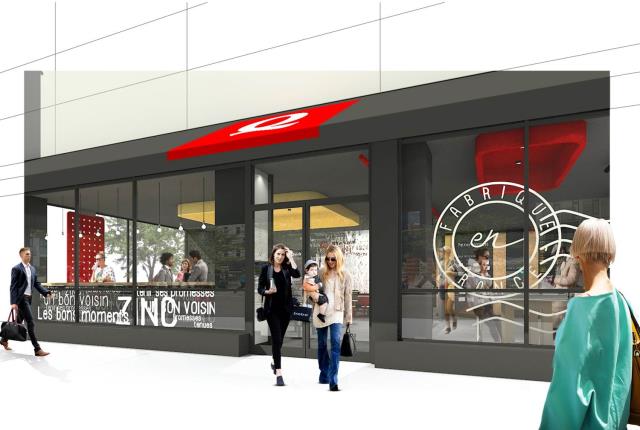 Façade du restaurant Quick situé en face du Stade de France : un logo indique 'Fabriqué en France'.