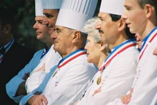 “Pour un chef, il est primordial qu’il y ait un bon tandem”, clame Paul Bocuse. Ici, au centre,...