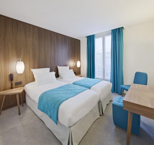 les décorateurs se sont plongés dans l'univers des sixties, utilisant tout à tour l'orange et le turquoise, deux couleurs emblématiques de ces années-là. Ici l'une des 48 chambres.