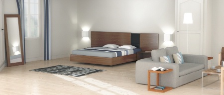 A été posé au sol, un parquet de couleur claire pour respecter le style épuré et contemporain de la chambre. La Bégude Saint-Pierre.