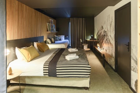 Les chambres premium aux tons sobres et raffinés.
