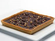 Tarte carré chocolatée cuite de Coup de Pates. Tarte carré chocolatée cuite de Coup de Pates.