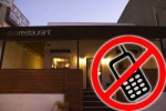 Un restaurant californien met les téléphones mobiles à la porte