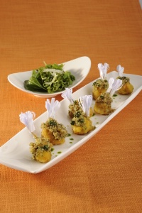 Cuisses de grenouilles gratinées aux herbes fraîches.
