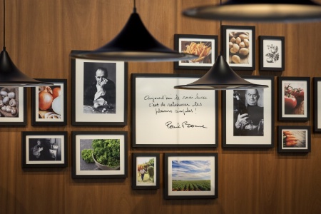 Des photos et des citations de Paul Bocuse.